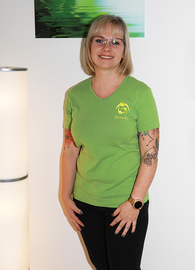 Bild von Sandy Mohaupt in Praxiskleidung